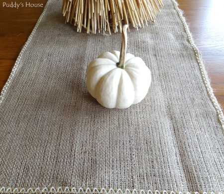 Fall - tablerunner with white pumpkin and wheat up close