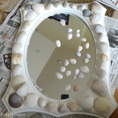 DIY Seashell Mirror - first layer of shells on mirror