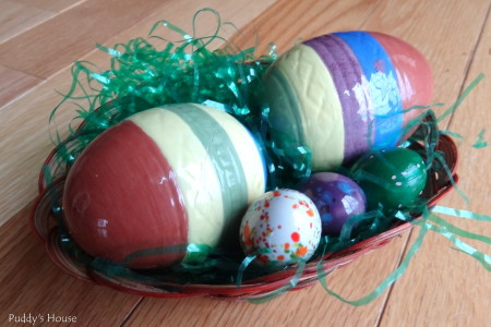 Easter Decorating - yard sale basket and ceramic eggs